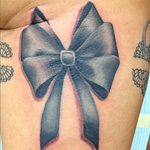 MJ Bonanno - Bow Garter Belt Tattoo